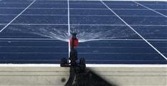 G-Type sprinkler installed along a solar module row